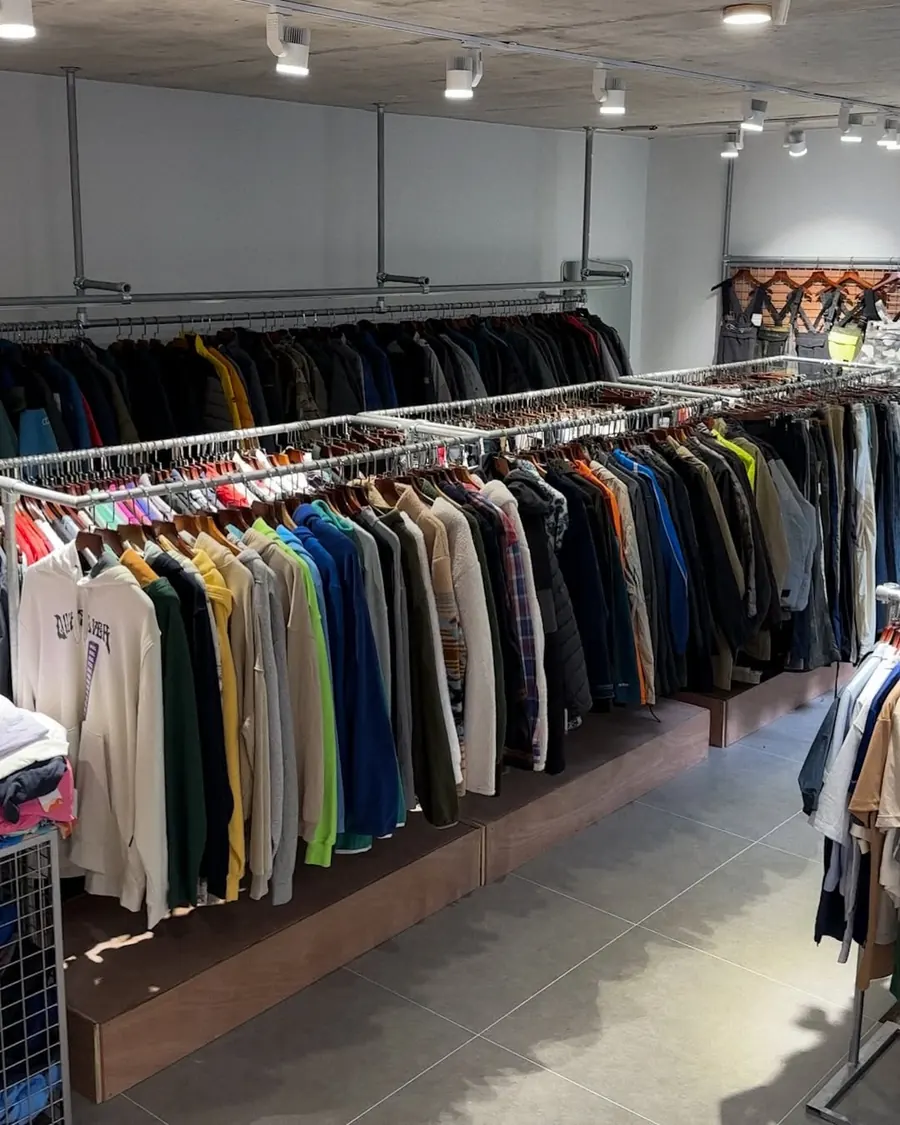 Racks of hoodies and sweatshirts at The Gate Tam Cốc